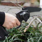 The Timber Titan 6-Inch Mini Chainsaw: for real men only.