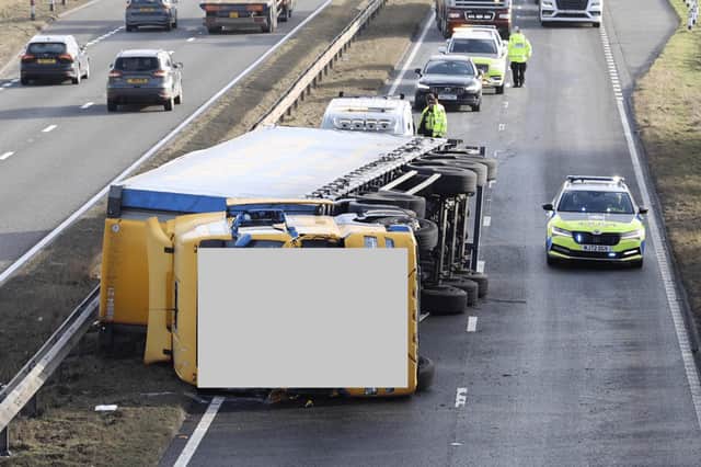 An overturned lorry blocking the A19