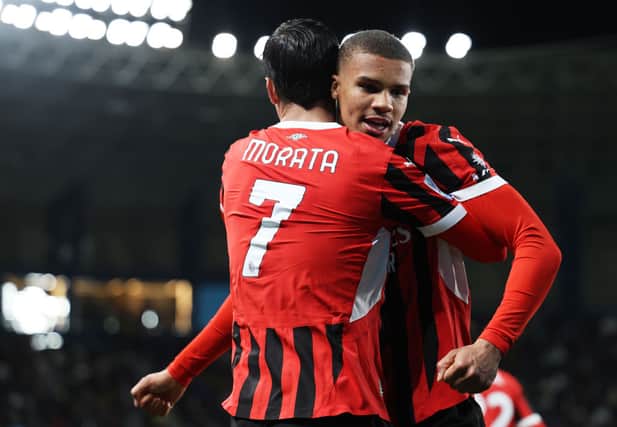 Alvaro Morata and Malick Thiaw of AC Milan celebrate their team's second goal, an own goal scored by Federico Gatti of Juventus during the Italian Super Cup Semi-Final match between AC Milan and Juventus at Al Awwal Park on January 03, 2025 in Riyadh, Saudi Arabia. (Photo by Yasser Bakhsh/Getty Images)