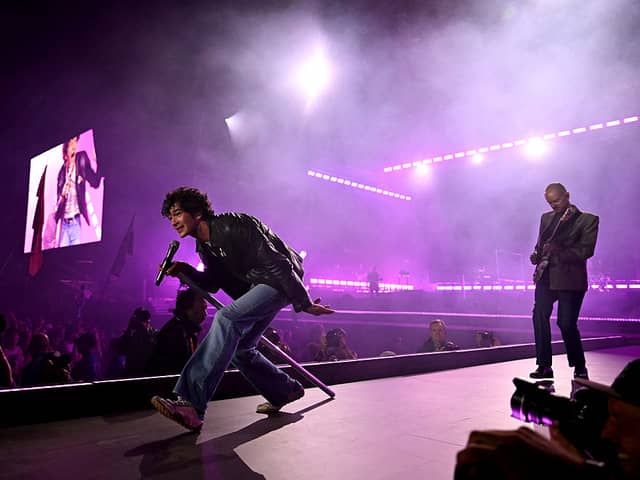 The 1975, fronted by Matty Healy perform on the Pyramid stage during the third day of the Glastonbury festival at Worthy Farm        