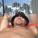 Newcastle United skipper Bruno Guimaraes relaxing on his holidays, in his typical bucket hat. The club return to pre-season training next week.