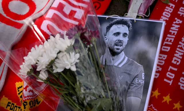 Tributes are laid for Diogo Jota at Anfield on July 04, 2025 in Liverpool, England. The Liverpool player and Portugal international Diogo Jota, 28, was killed in a car crash yesterday in Zamora, Spain. He was travelling with his brother, returning to the UK for the start of the Premier League season