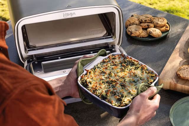 Cooking up more than just pizza — the Ninja Artisan Outdoor Oven can handle hearty bakes too.