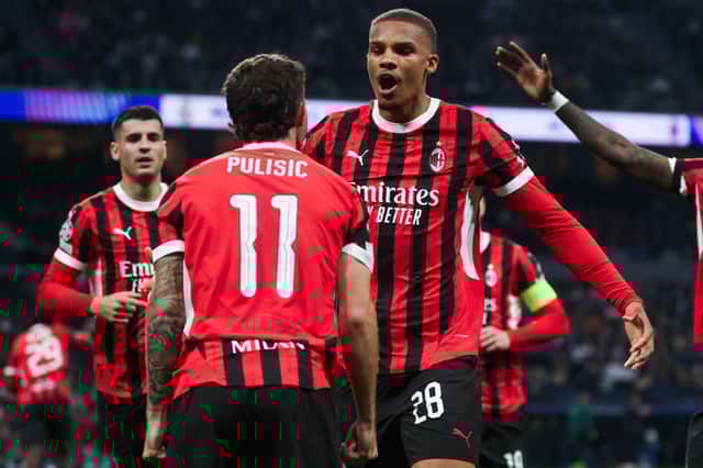 TOPSHOT - AC Milan's German defender #28 Malick Thiaw celebrates scoring their first goal during the UEFA Champions League, league phase day 4 football match between Real Madrid CF and AC Milan at the Santiago Bernabeu stadium in Madrid on November 5, 2024. (Photo by Pierre-Philippe MARCOU / AFP)