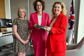 Myself and Laura Collins (Publisher, Worlds Division, National World), handing over the folder containing over 400 anonymous responses to our Endo the Battle survey to Baroness Merron, Minister for Patient Safety, Women's Health and Mental Health.