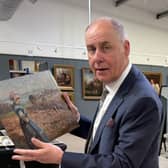 John Anderson, Head of Pictures at auctioneers Anderson & Garland, with one of the pictures which fetched thousands.