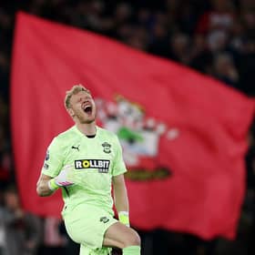 Aaron Ramsdale of Southampton celebrates after team-mate Paul Onuachu scored the opening goal during the Premier League match between Southampton FC and Crystal Palace FC at St Mary's Stadium on April 02, 2025 in Southampton, England. (Photo by Dan Istitene/Getty Images)