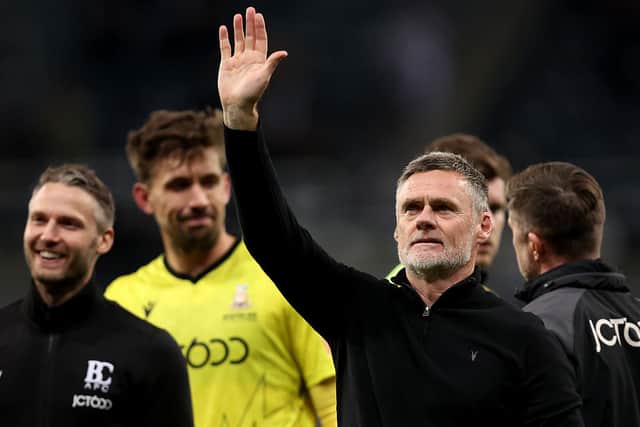 Graham Alexander, Manager of Bradford City acknowledges the fans after the Carabao Cup Third Round match between Newcastle United and Bradford City at St James' Park on September 24, 2025 in Newcastle upon Tyne, England. (Photo by George Wood/Getty Images)