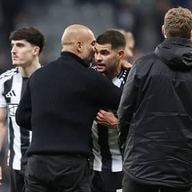 Pep Guardiola, Manager of Manchester City, talks with Bruno Guimaraes of Newcastle United after the Premier League match between Newcastle United and Manchester City at St James' Park on November 22, 2025 in Newcastle upon Tyne, England. (Photo by George Wood/Getty Images)
