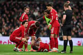 Alexander Isak of Liverpool is seen on the floor after a foul from Micky van de Ven of Tottenham Hotspur (not pictured) during the Premier League match between Tottenham Hotspur and Liverpool at Tottenham Hotspur Stadium on December 20, 2025 in London, England. (Photo by Alex Pantling/Getty Images)