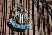 A general view of the Newcastle United badge on a set of gates outside the stadium prior to the Premier League match between Newcastle United and Nottingham Forest at St James' Park on October 05, 2025 in Newcastle upon Tyne, England. (Photo by George Wood/Getty Images)