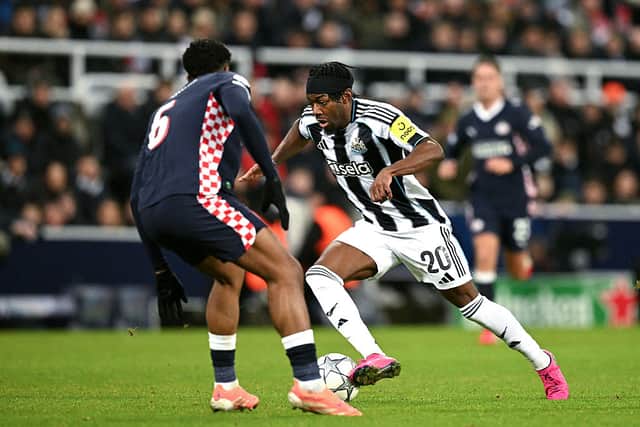 Newcastle United's English midfielder #20 Anthony Elanga runs with the ball during the UEFA Champions League league-phase football match between Newcastle United and PSV Eindhoven at St James' Park in Newcastle-upon-Tyne, north-east England on January 21, 2026. (Photo by Oli SCARFF / AFP via Getty Images)