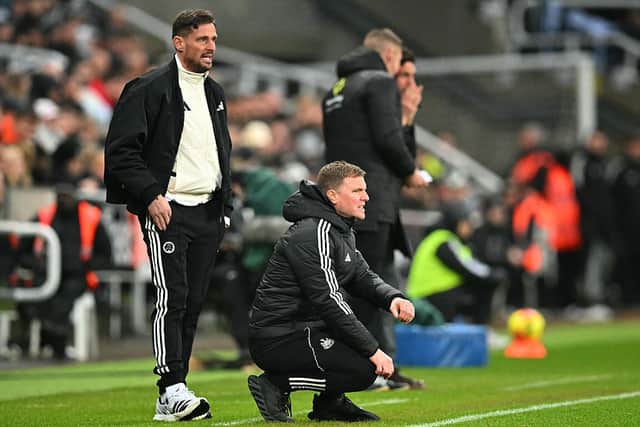 Newcastle United's English head coach Eddie Howe (C) and Newcastle United's assistant coach Jason Tindall (L) look on during the English Premier League football match between Newcastle United and Brentford at St James' Park in Newcastle-upon-Tyne, north east England on February 7, 2026. (Photo by ANDY BUCHANAN / AFP via Getty Images)