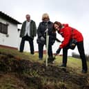 Elected Mayor Karen Clark, Mary Glindon MP, and Vice-chair of the Hadrian's Wall management board Bill Griffiths, at the Sycamore sapling planting