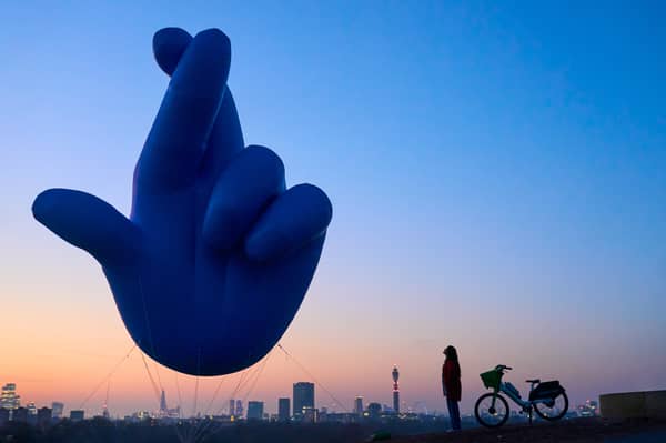 The National Lottery launched a crossed fingers balloon above London’s Primrose Hill.