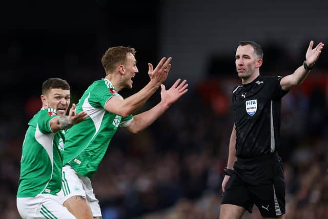 Kieran Trippier and Dan Burn of Newcastle United react after referee Chris Kavanagh and assistant referee Nick Greenhalgh failed to award a penalty during the Emirates FA Cup Fourth Round match between Aston Villa and Newcastle United on February 14, 2026 in Birmingham, England. (Photo by Dan Istitene/Getty Images)