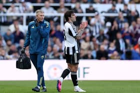 Sandro Tonali of Newcastle United applauds the fans as he walks off the pitch with an injury during the Premier League match between Newcastle United and West Ham United at St James' Park on May 17, 2026 in Newcastle upon Tyne, England. (Photo by Stu Forster/Getty Images)
