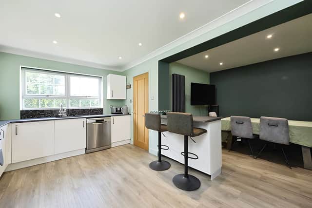 Kitchen and dining space is designed to bring everyday family life together around the breakfast bar