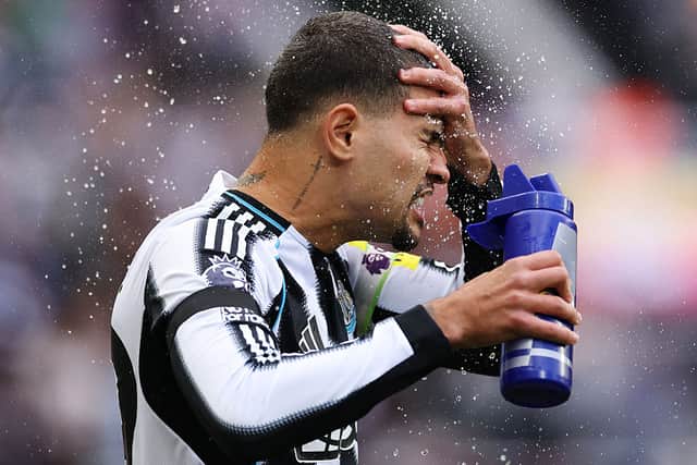 Bruno Guimaraes of Newcastle United splashes water on his face prior to the Premier League match between Newcastle United and Arsenal at St James' Park on September 28, 2025 in Newcastle upon Tyne, England. (Photo by Stu Forster/Getty Images)