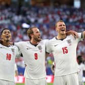 Dan Burn #15, Harry Kane #9 and Jude Bellingham #10 of England celebrate after the 2-1 victory during the FIFA World Cup 2026 Quarter Final match between Norway and England at Miami Stadium on July 11, 2026 in Miami Gardens, Florida. (Photo by Dustin Satloff/Getty Images for Rexona)
