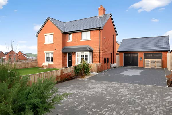 The impressive corner plot gives this substantial detached home a strong first impression before stepping inside.