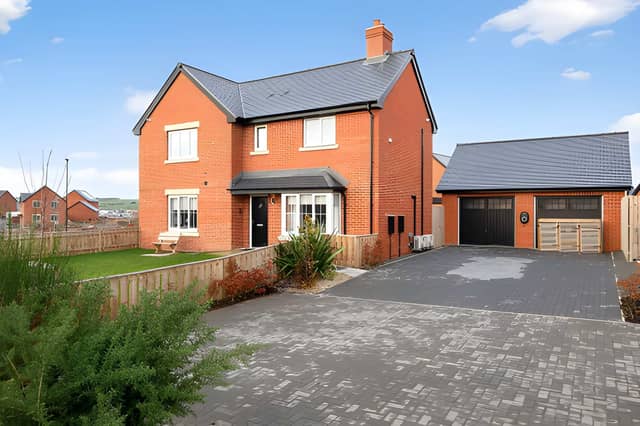 The impressive corner plot gives this substantial detached home a strong first impression before stepping inside.