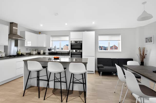 The generous kitchen and dining area has been designed to bring everyday family life and entertaining together.