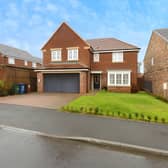 This modern detached home offers an impressive first impression in a well-established residential setting.