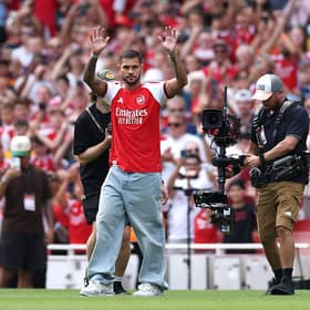Bruno Guimaraes of Arsenal waves to fans as he is unveiled as a new Arsenal player before the during the pre-season friendly match between Arsenal FC and Borussia Dortmund at Emirates Stadium on August 09, 2026 in London, England. (Photo by Justin Setterfield/Getty Images)