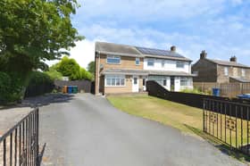 The semi-detached Hexham Road home has an enclosed front garden and a large driveway offering parking for multiple vehicles