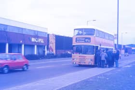 Taking you back to 1977 for a look at passengers waiting to get in the number 21 bus at Scotswood Road.