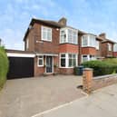 The Park Avenue home sits within Gosforth's Grange Park Estate, with a block-paved driveway providing off-street parking