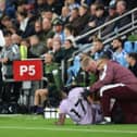 Matthias Jaissle, Manager of Newcastle United, looks across as Bazoumana Toure of Newcastle United receives medical attention after sustaining an injury during the Premier League 2026/27 match between Coventry City and Newcastle United at The Coventry Building Society Arena on October 12, 2026 in Coventry, England. (Photo by Dan Istitene/Getty Images)