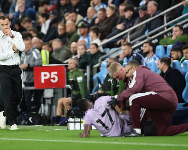 Matthias Jaissle, Manager of Newcastle United, looks across as Bazoumana Toure of Newcastle United receives medical attention after sustaining an injury during the Premier League 2026/27 match between Coventry City and Newcastle United at The Coventry Building Society Arena on October 12, 2026 in Coventry, England. (Photo by Dan Istitene/Getty Images)