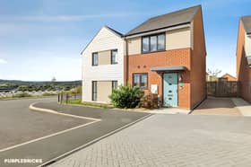 The semi-detached house at Willowford Place has a driveway offering off-road parking for multiple vehicles