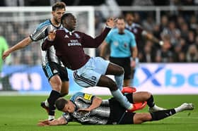 Newcastle United's Dutch defender #04 Sven Botman (down) fouls Aston Villa's Senegalese striker #11 Nicolas Jackson (up) during the English Premier League football match between Newcastle United and Aston Villa at St James' Park in Newcastle-upon-Tyne, north east England on October 17, 2026. (Photo by Paul ELLIS / AFP via Getty Images)