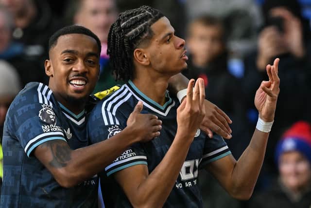 Newcastle United's Danish striker #10 William Osula (R) celebrates after scoring his team's first goal during the English Premier League football match between Crystal Palace and Newcastle United at Selhurst Park in south London on October 25, 2026. (Photo by Glyn KIRK / AFP via Getty Images)