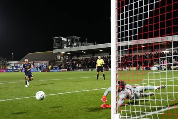 Jay Lynch denies Bruno Guimaraes to help Fleetwood beat Arsenal on penalties (Nick Potts/PA)