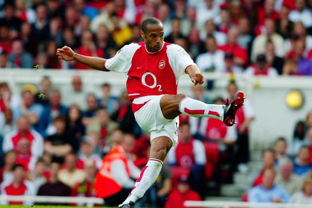 Thierry Henry shoots at goal.