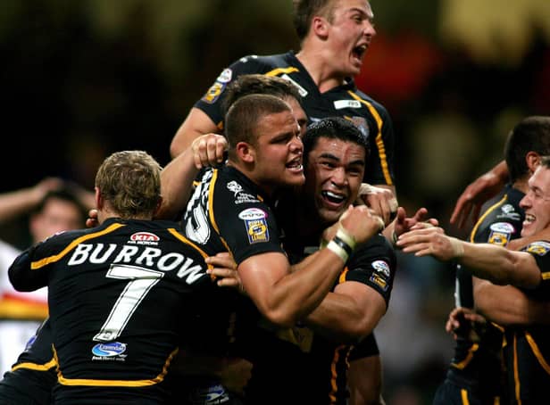 <p>Jordan Tansey is mobbed by team-mates after his late winning try for Leeds Rhinos against Bradford Bulls at the first Magic Weekend in Cardiff back in 2007: Picture: Gareth Copley/PA Wire.</p>