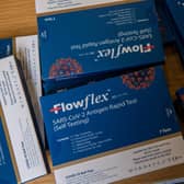 Lateral Flow test kits are available across the city. (Photo by Chris J Ratcliffe/Getty Images)