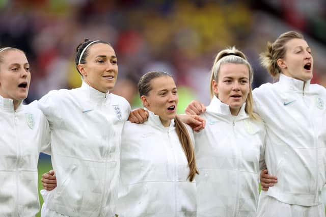 SHEFFIELD, ENGLAND - JULY 26: Lucy Bronze, Fran Kirby and Lauren Hemp line up for the national anthem during the UEFA Women's Euro 2022 Semi Final match between England and Sweden at Bramall Lane on July 26, 2022 in Sheffield, England. (Photo by Naomi Baker/Getty Images)