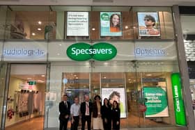 Ms Onwurah and the visiting party from Specsavers.