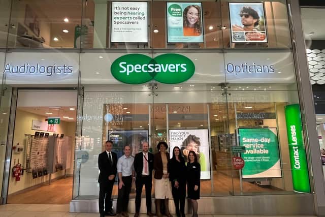 Ms Onwurah and the visiting party from Specsavers.