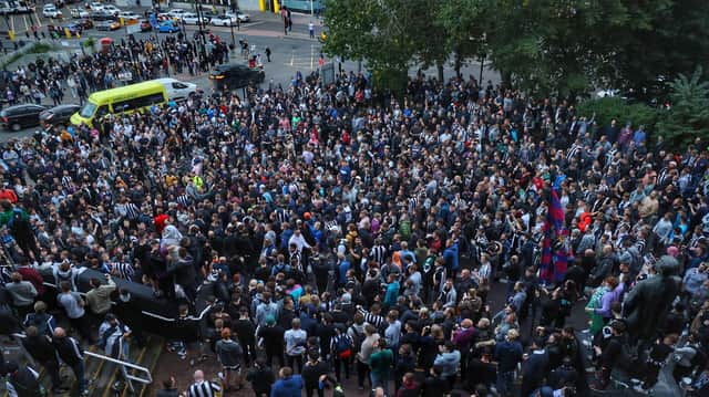 Newcastle United fans outside St James's Park.
