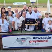 Greyhound owner and enthusiast Craig Armstrong (centre, rear) with friends at Newcastle Stadium.