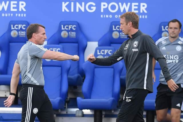 Brendan Rodgers and Graham Potter.  (Photo by MICHAEL REGAN/POOL/AFP via Getty Images)