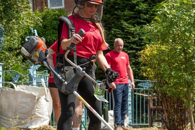 The Lovell team brought power tools to help with the garden transformation at The Lemington Centre.