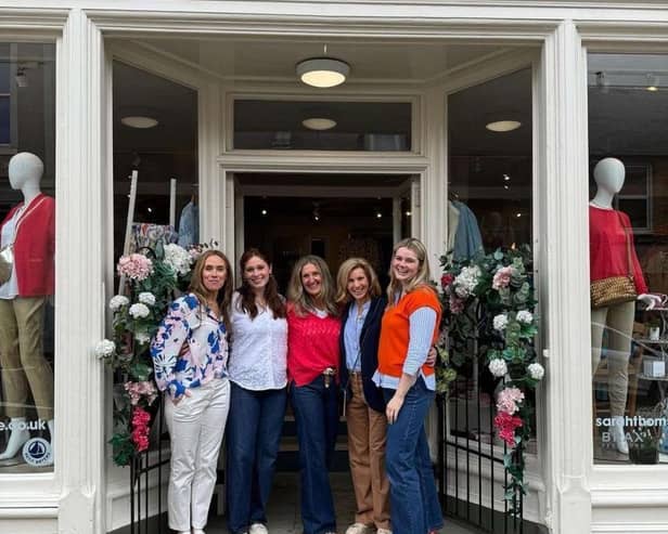 Sarah Thomson (L) at her store in Melrose, Scotland