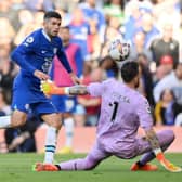 Christian Pulisic of Chelsea scores their side's second goal past Jose Sa of Wolverhampton Wanderers during the Premier League match between Chelsea FC and Wolverhampton Wanderers at Stamford Bridge on October 08, 2022 in London, England. (Photo by Justin Setterfield/Getty Images)